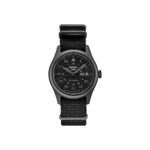 Sleek Seiko automatic watch with black nylon strap and luminous hands for versatile style.