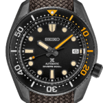 Seiko diving watch featuring a black dial, luminous markers, and durable brown strap for scuba enthusiasts.
