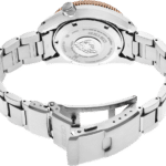 Sleek dive watch with stainless steel and rose gold, ideal for underwater adventures.