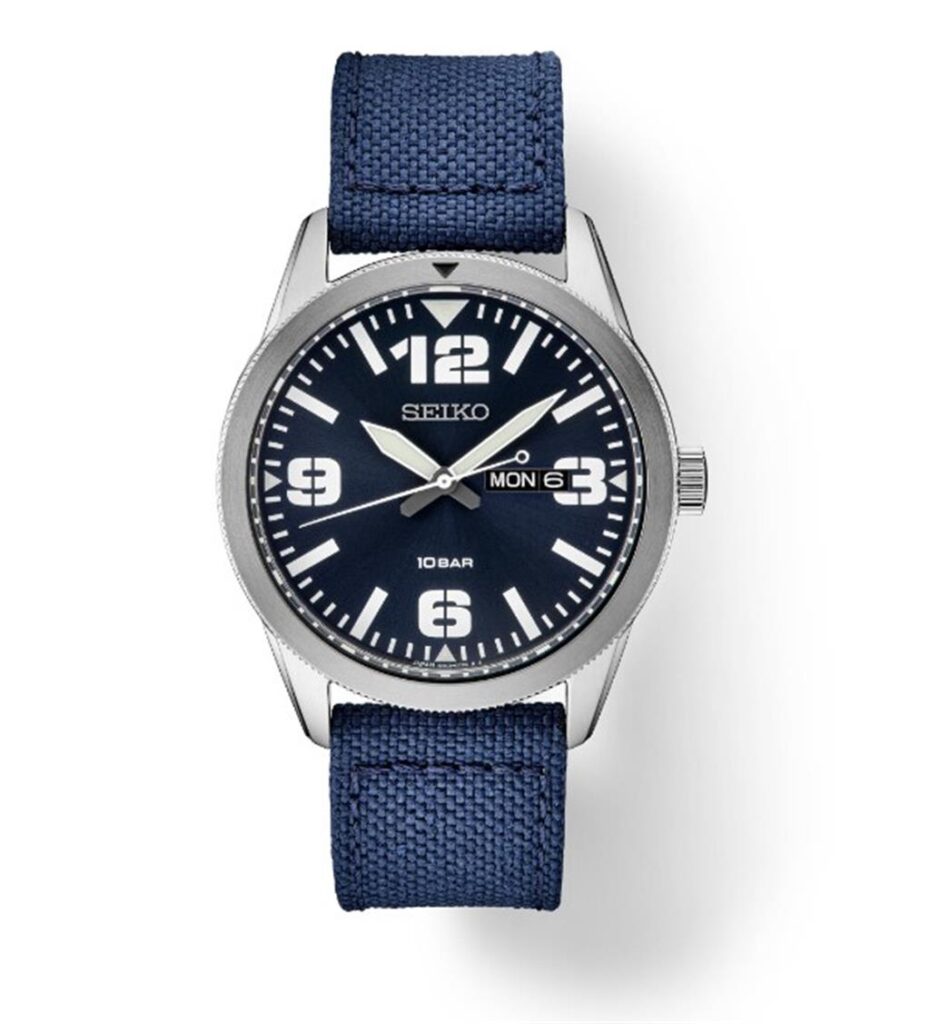 Stylish Seiko watch with navy blue face, silver casing, and durable fabric strap.