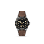 Stylish Tudor diving watch features a matte black dial, vintage accents, and a durable leather strap.