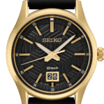 Stylish Seiko wristwatch with black dial, gold accents, date display, and durable rubber band.