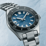 Sporty Seiko watch with blue dial, stainless steel case, and diving capabilities up to 200 meters.