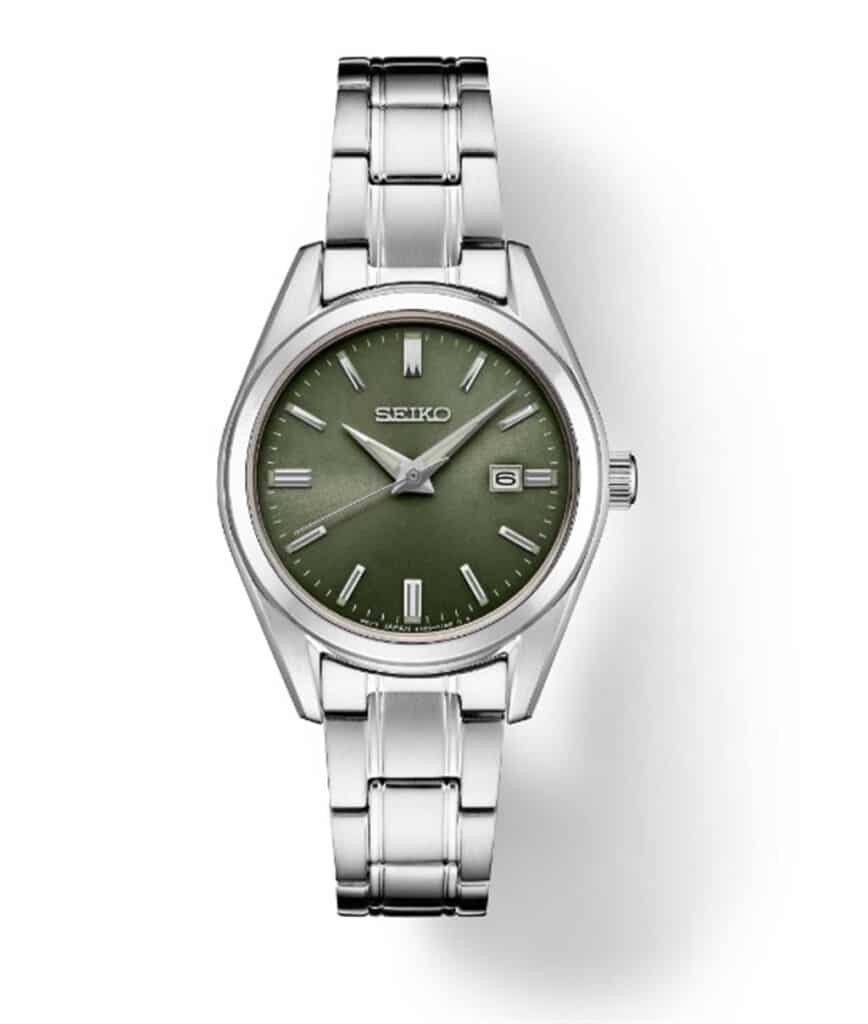 Stylish Seiko watch with vibrant green dial and polished stainless steel bracelet.