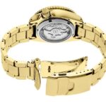 Elegant gold watch with intricate mechanics and luxurious interlocking metal link strap.