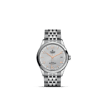 Tudor stainless steel watch with silver dial, elegant design, and modern orange accents.
