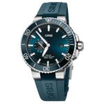 Oris Aquis dive watch features a navy blue gradient dial and durable rubber strap.