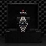 Tudor watch in luxury box, showcasing elegant design and premium craftsmanship.