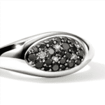 Elegant ring with black and white gemstones, perfect for modern jewelry collections and special occasions.
