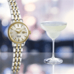 Elegant Seiko Presage watch paired with a stylish cocktail in a chic social setting.