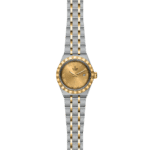 Elegant Tudor watch featuring a gold bezel, Roman numerals, and a luxurious two-tone bracelet.