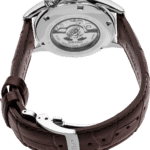 Elegant Seiko watch with stainless steel case, leather strap, and transparent case back showcasing intricate movement.