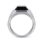 Modern black stone ring with geometric cut and sleek polished band for stylish elegance.