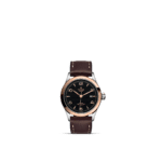 Elegant Tudor watch with stainless steel, rose gold, and brown leather strap showcases luxury design.