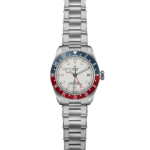 Tudor GMT watch with polished stainless steel case and vibrant red and blue bezel.