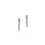 Elegant white gold hoop earrings with sparkling diamonds, perfect for any occasion.