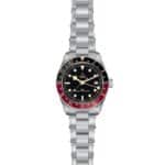 Tudor GMT watch featuring stainless steel, black dial, luminous markers, and bidirectional rotating bezel.