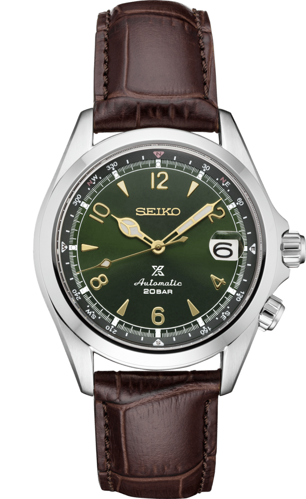 Elegant Seiko watch with green dial, gold accents, stainless steel case, and brown leather strap.