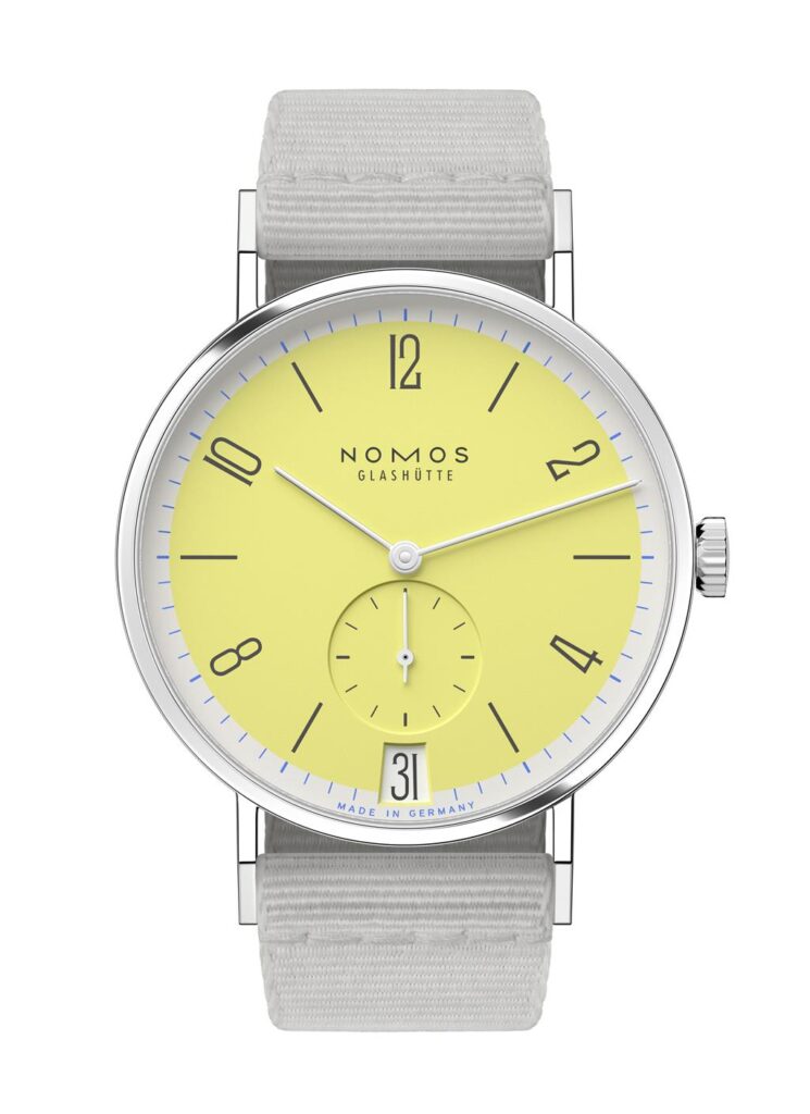 NOMOS Glashüttes vibrant yellow dial wristwatch with stainless steel case and gray textile strap.