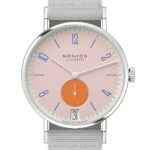 Elegant Nomos Glashütte watch with pink dial, stainless steel case, and gray textile strap.