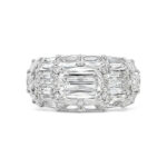 Elegant diamond ring in white gold with emerald-cut stones, perfect for special occasions.