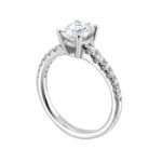 Elegant white gold engagement ring featuring an oval diamond and sparkling accent stones.