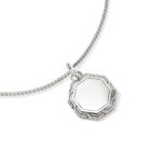 Elegant silver octagonal pendant necklace on a textured chain, perfect for modern fashionistas.