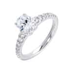 Elegant engagement ring with a round-cut diamond, pave-set accents, crafted in white gold.