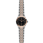 Tudor luxury watch with rose gold bezel, stainless steel bracelet, and luminous black dial.