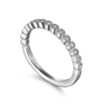 Elegant white metal ring adorned with sparkling gemstones, perfect for special occasions or everyday wear.