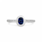 Elegant sapphire ring with diamonds, perfect for commitments and special occasions.