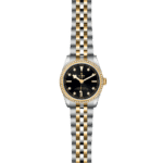 Luxury Tudor watch with diamond accents, black dial, and two-tone stainless steel and gold bracelet.