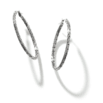 Elegant silver hoop earrings with intricate patterns, perfect for any occasion.