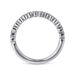 Elegant baguette gemstone ring in polished silver or white gold, perfect for any occasion.