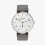 Stylish NOMOS Glashütte minimalist watch with a sleek design and gray fabric strap.