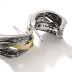 Elegant silver and gold earrings with intricate design, perfect for formal and casual occasions.