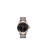 Elegant Tudor watch with rose gold bezel, black guilloché dial, and sophisticated stainless steel bracelet.