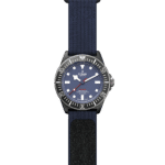 Stylish Tudor dive watch with navy blue dial, luminous markers, and durable textile strap.
