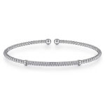 Elegant silver bracelet with beaded design and sparkling stones, perfect for any occasion.
