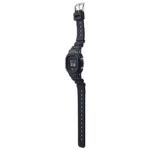 Modern black digital wristwatch with pink accents, LCD display, and adjustable silicone strap.