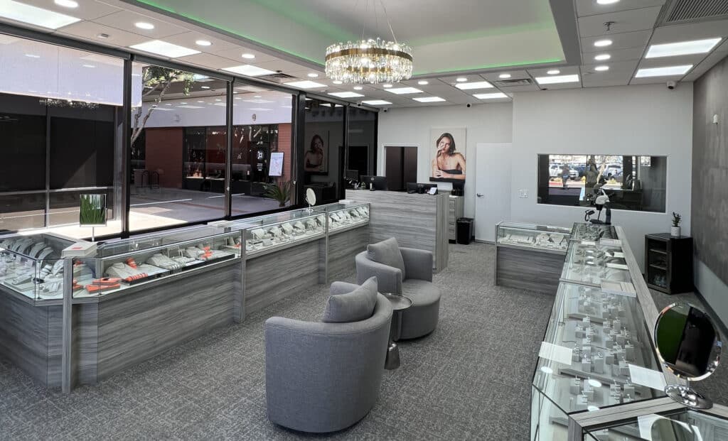 Elegant modern jewelry store interior with bright displays and inviting atmosphere.