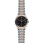 Elegant Tudor watch in stainless steel and rose gold with a black dial and unique bracelet.