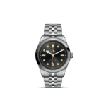 Elegant Tudor watch featuring a black dial, gold accents, and stainless steel bracelet.