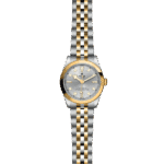 Elegant Tudor watch featuring a stainless steel case, gold bezel, and stylish Jubilee bracelet.