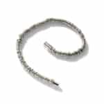 Stylish silver coil bracelet with flexible design, perfect for modern fashion and elegant occasions.