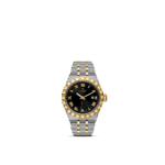 Tudor luxury watch with stainless steel and gold accents, featuring a black dial and Roman numerals.