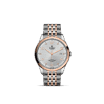 Elegant Tudor watch with silver dial, rose gold accents, and stainless steel bracelet for luxury style.