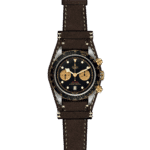 Elegant Tudor chronograph watch in stainless steel with black face and brown leather strap.