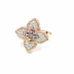 Floral-inspired ring with colorful gemstones and sparkling stones, perfect for any elegant occasion.