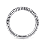 Elegant silver ring with baguette gemstones, perfect for classic and contemporary jewelry lovers.